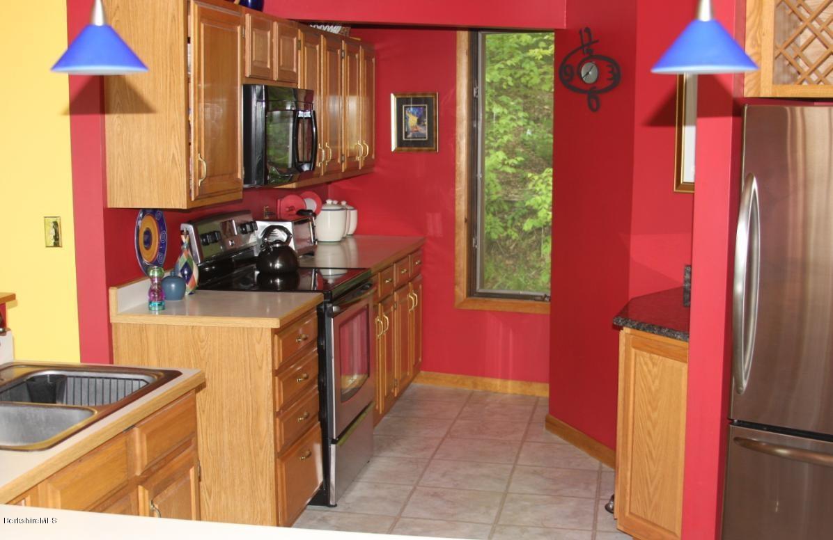 234 East Slope Road Richmond, MA 01201 - Photo 3 of 8 a kitchen that has a sink and a stove
