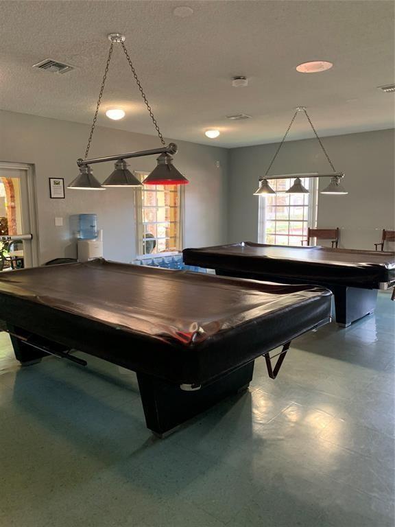 257 South Cypress Road, Unit 435 Pompano Beach, FL 33060 - Photo 12 of 18 a room with pool table and window