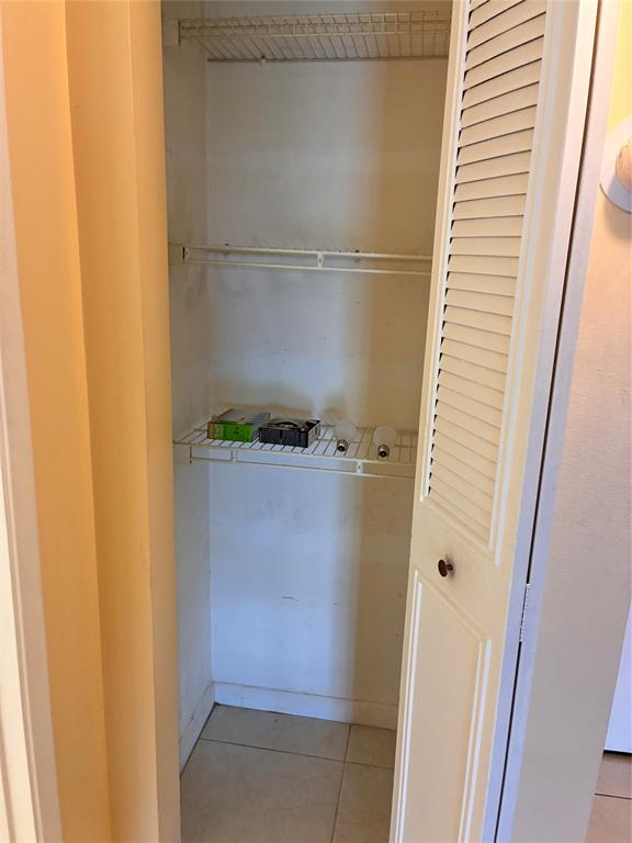 257 South Cypress Road, Unit 435 Pompano Beach, FL 33060 - Photo 4 of 18 a close view of cabinet