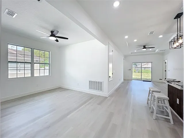 a kitchen with a stove and a sink