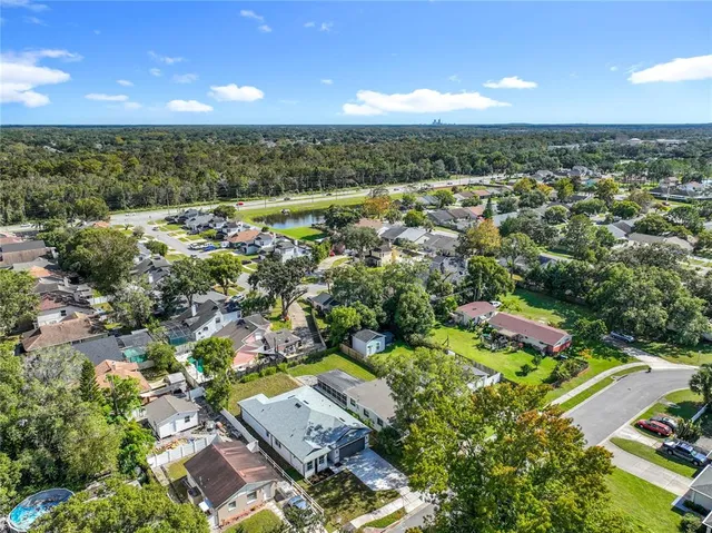 a view of livingroom with hardwood floor and a ceiling fan
