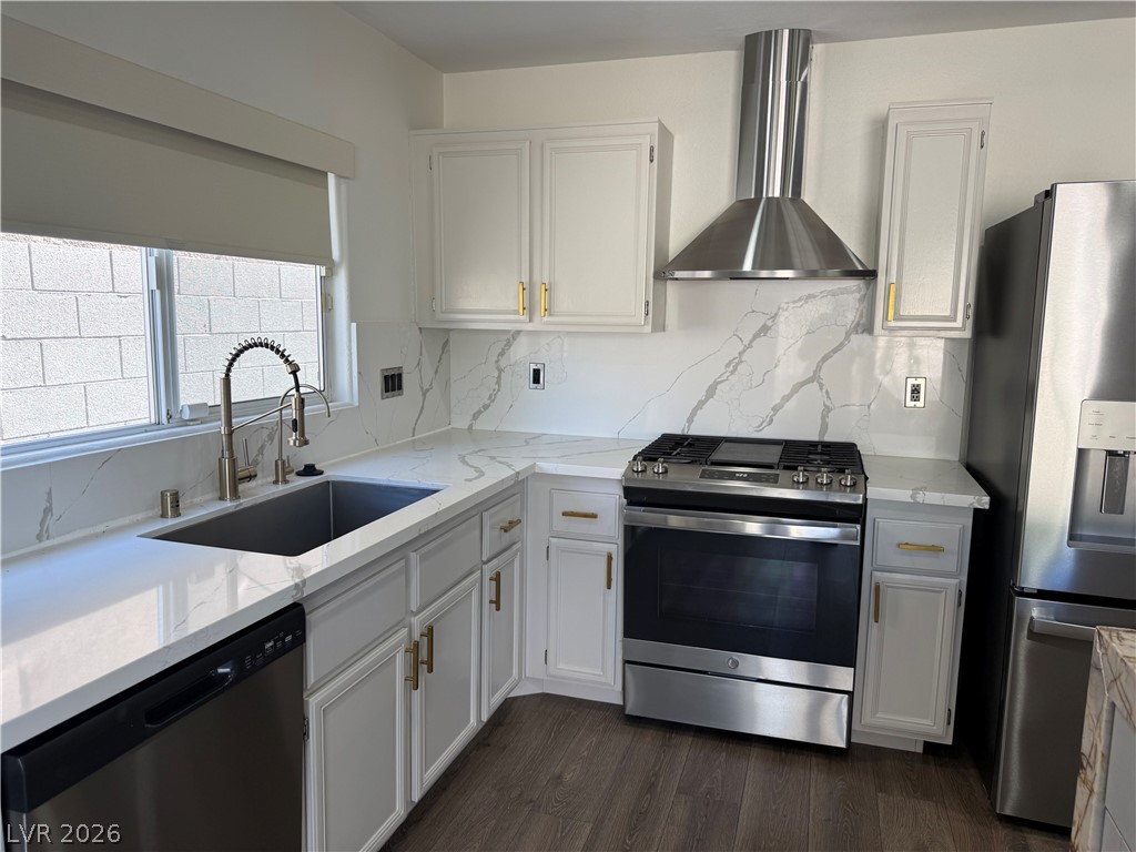 1141 Cathedral Ridge Street Henderson, NV 89052 - Photo 26 of 77 This bright kitchen features sleek appliances and ample counter space for daily living.