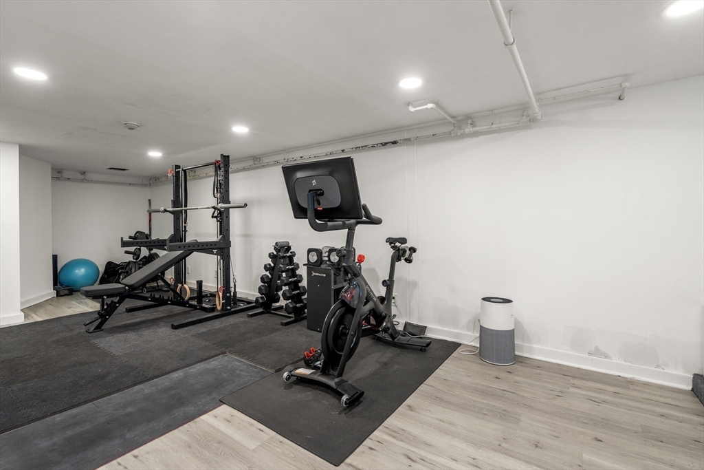 48 Spring Street Wakefield, MA 01880 - Photo 22 of 28 a view of a room with gym equipment