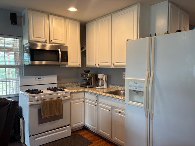 12151 State Highway 75 North Buffalo, TX 75831 - Photo 15 of 50 a kitchen with a stove a sink and a microwave