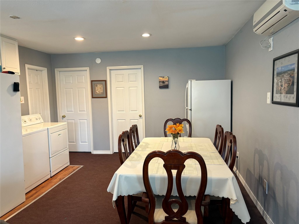 12151 State Highway 75 North Buffalo, TX 75831 - Photo 17 of 50 Charming dining area with convenient access to two adjoining bedrooms and a nearby utility space.