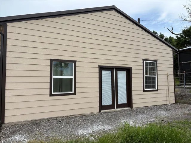 a bathroom with a sink a toilet and vanity