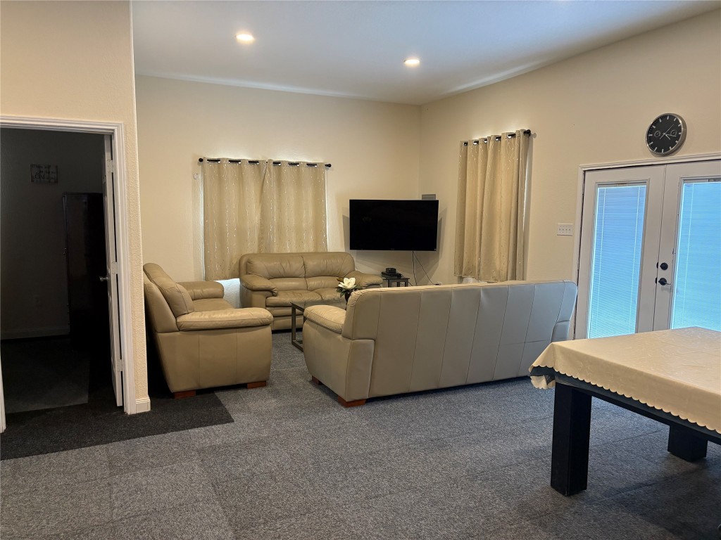 12151 State Highway 75 North Buffalo, TX 75831 - Photo 23 of 50 a living room with furniture and a flat screen tv