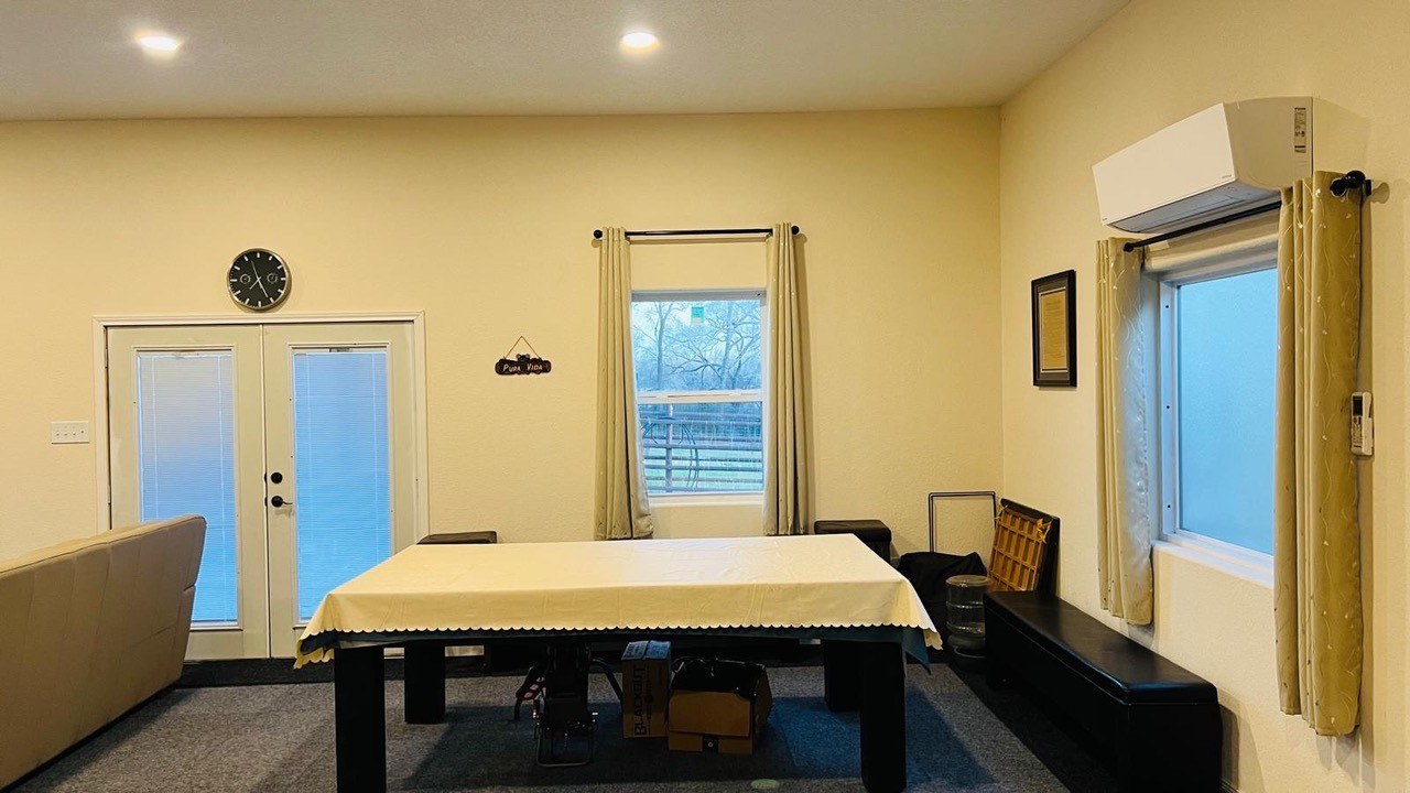 12151 State Highway 75 North Buffalo, TX 75831 - Photo 25 of 50 Open area to the right opposite kitchen. The door can serve as a from door. Views all around from this room.