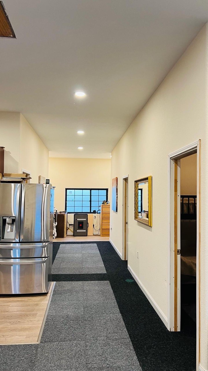12151 State Highway 75 North Buffalo, TX 75831 - Photo 26 of 50 Expansive corridor seamlessly connecting the open area to the bedrooms.