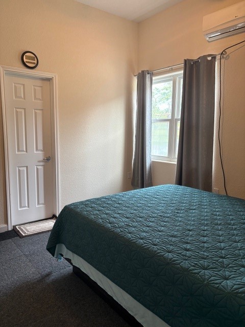 12151 State Highway 75 North Buffalo, TX 75831 - Photo 35 of 50 a bedroom with a bed and a window