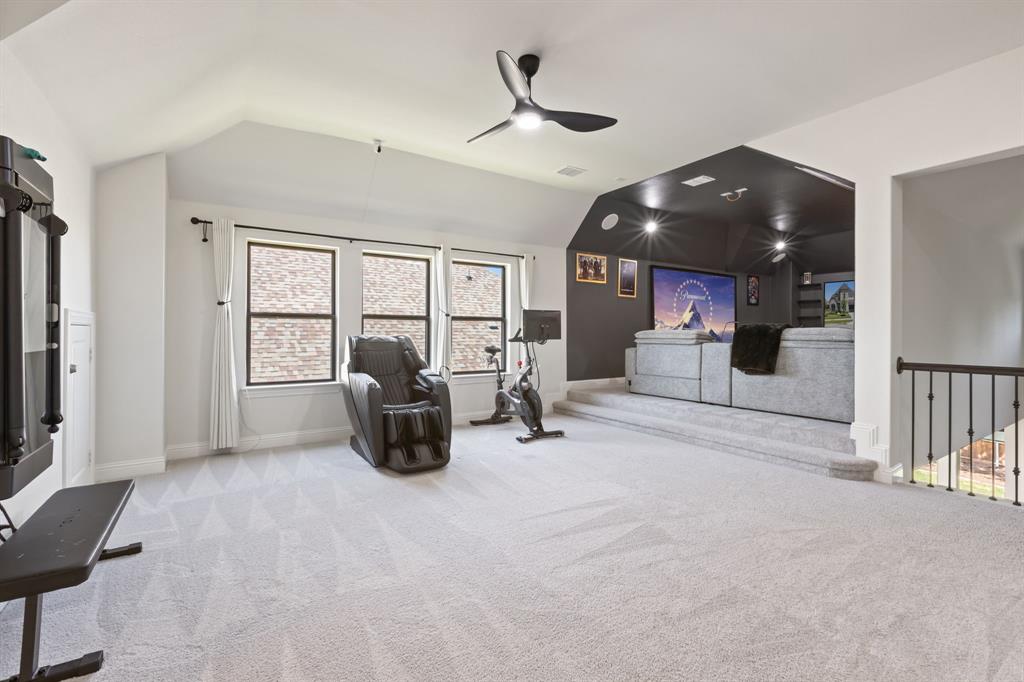 2116 Randas Way Rockwall, TX 75087 - Photo 24 of 40 a view of a livingroom with furniture and windows
