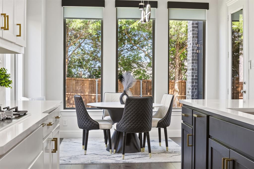 2116 Randas Way Rockwall, TX 75087 - Photo 5 of 40 a view of a dining room with furniture window and outside view