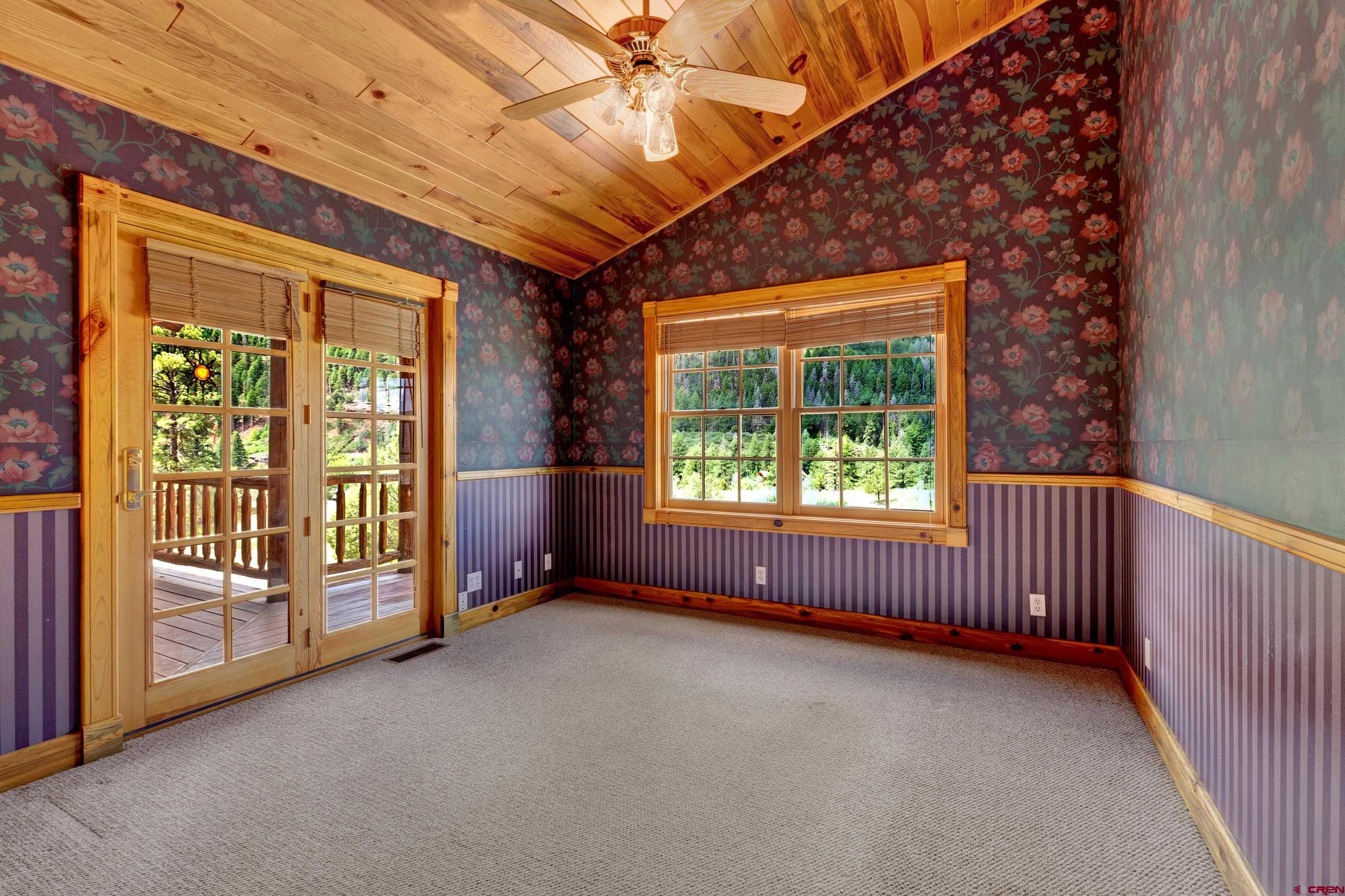 2692 County Road 17 Ridgway, CO 81432 - Photo 22 of 38 a view of an empty room with windows