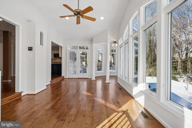 a view of a bedroom with windows