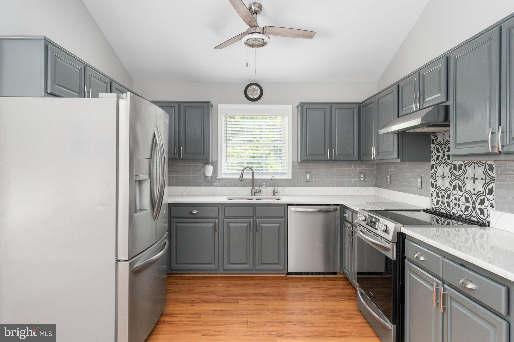8009 Burrell Road Fredericksburg, VA 22407 - Photo 11 of 66 Modern kitchen with sleek finishes.