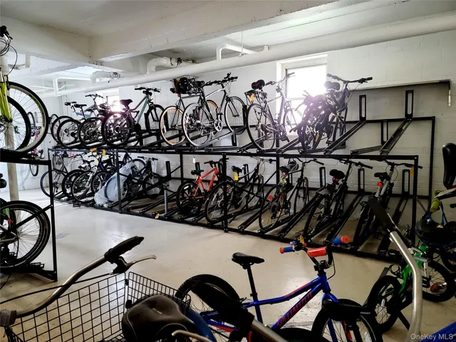 a view of parking area with lots of cars parked