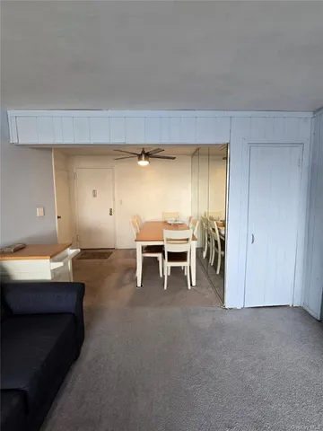 a bedroom with a bed and furniture