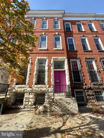 a front view of a building with glass windows