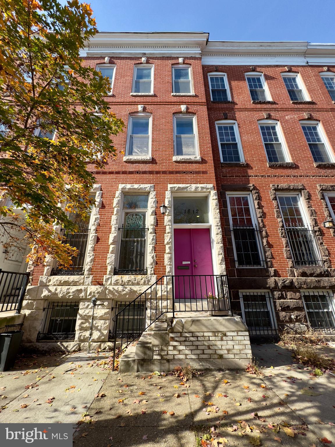 a front view of a building with glass windows