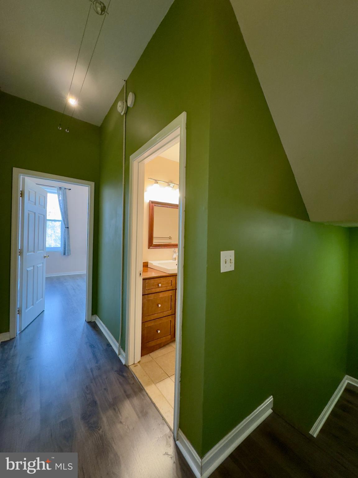 1812 North Calvert Street Baltimore, MD 21202 - Photo 3 of 24 a view of gallery with wooden floor