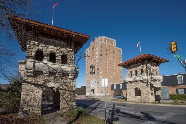 a white building with a clock on the top