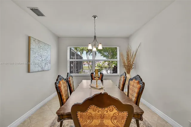 a kitchen with a sink stove and refrigerator