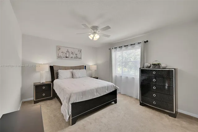 a view of a patio with a dining table and chairs