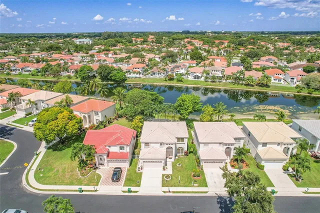 an aerial view of a house with a garden