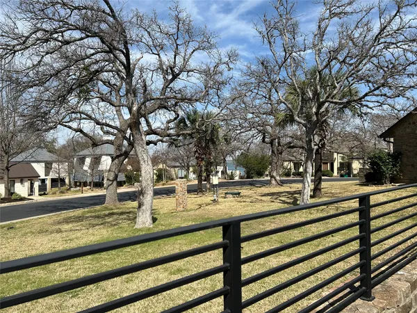 a view of a yard with street