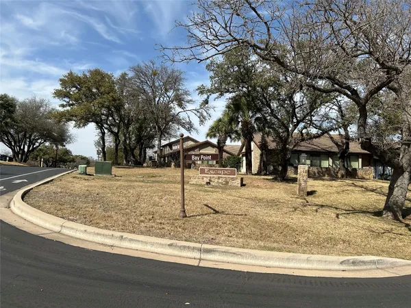 a view of a yard with a fountain