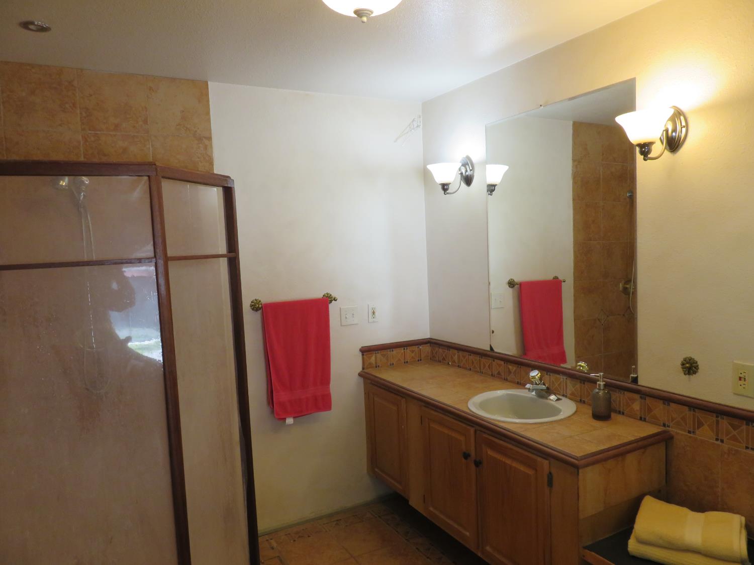 2400 Bald Mountain Road West Point, CA 95255 - Photo 11 of 68 a bathroom with a sink and mirror