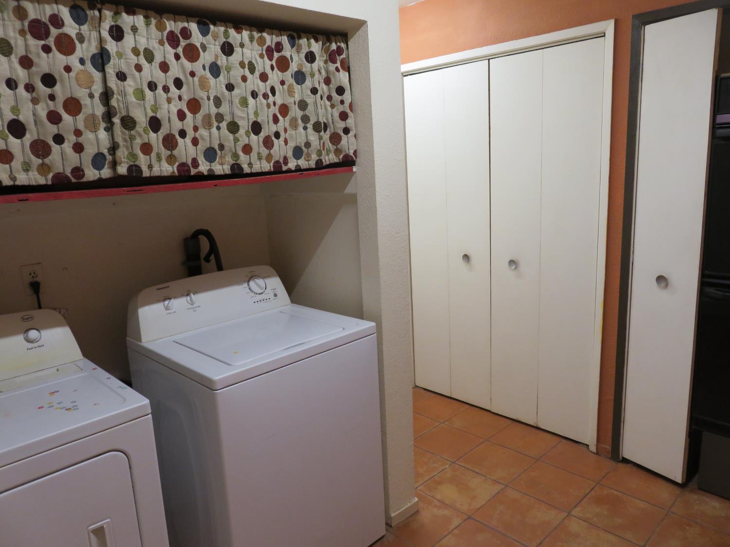 2400 Bald Mountain Road West Point, CA 95255 - Photo 19 of 68 a utility room with dryer and washer
