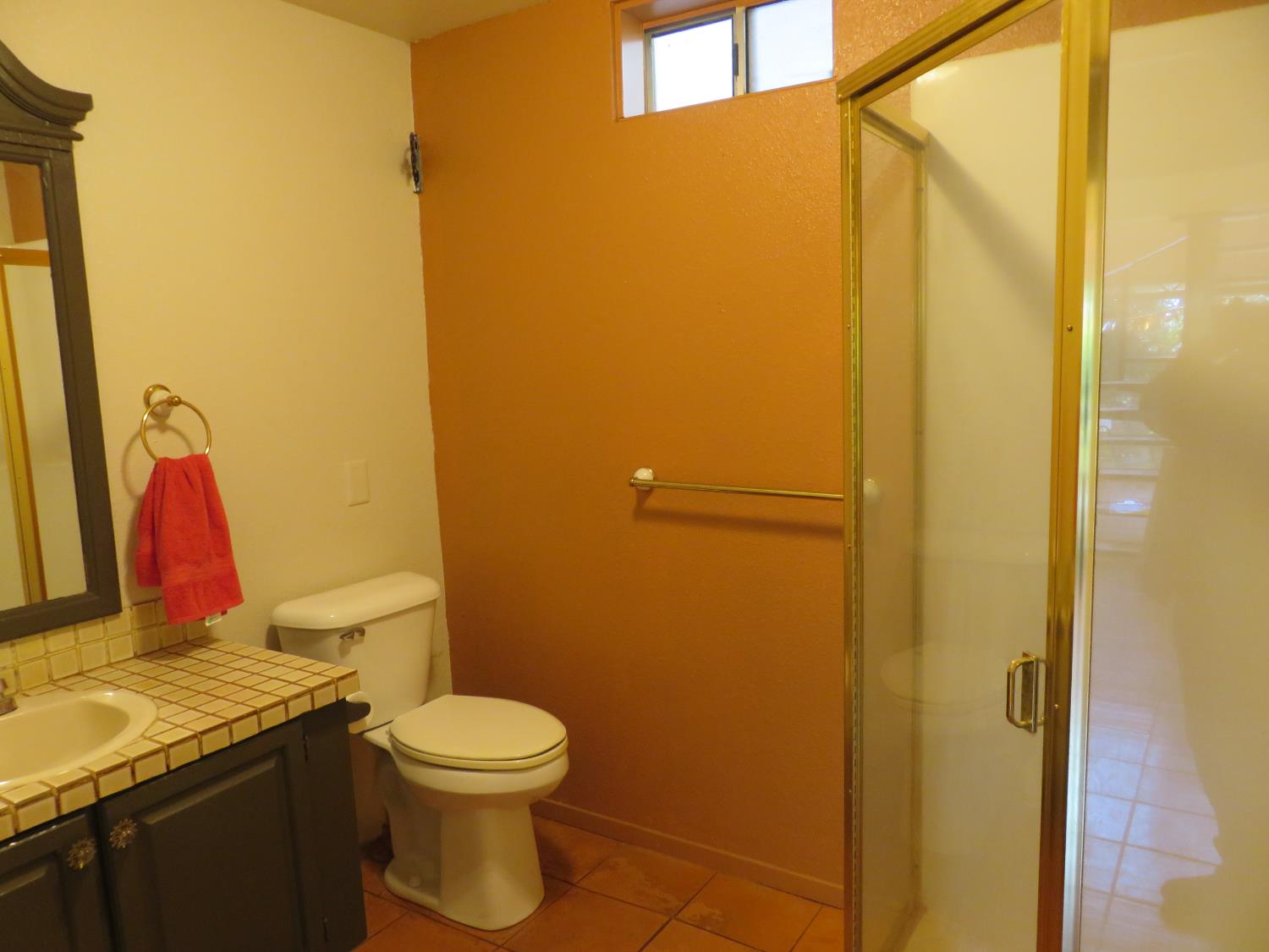 2400 Bald Mountain Road West Point, CA 95255 - Photo 20 of 68 a bathroom with a granite countertop sink toilet and a mirror