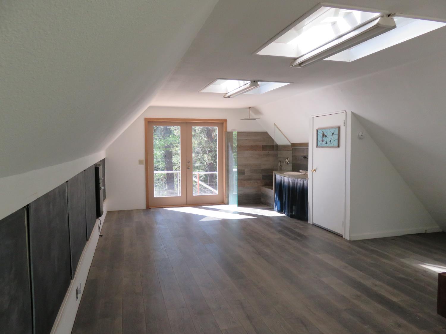 2400 Bald Mountain Road West Point, CA 95255 - Photo 55 of 68 wooden floor in an empty room with a window