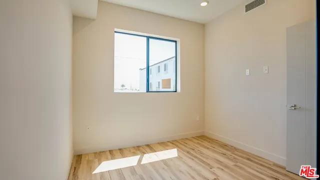 an empty room with a window