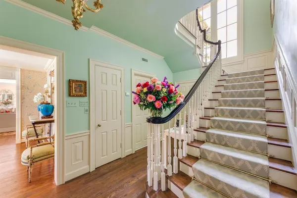 a view of entryway with wooden floor
