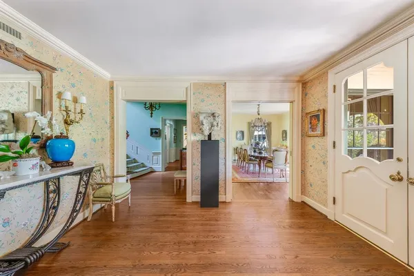 a view of a living room and dining room