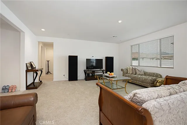 a view of a house with backyard and porch