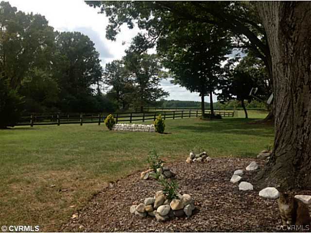 1745 Cardwell Road Crozier, VA 23039 - Photo 15 of 18 a view of a park with large trees