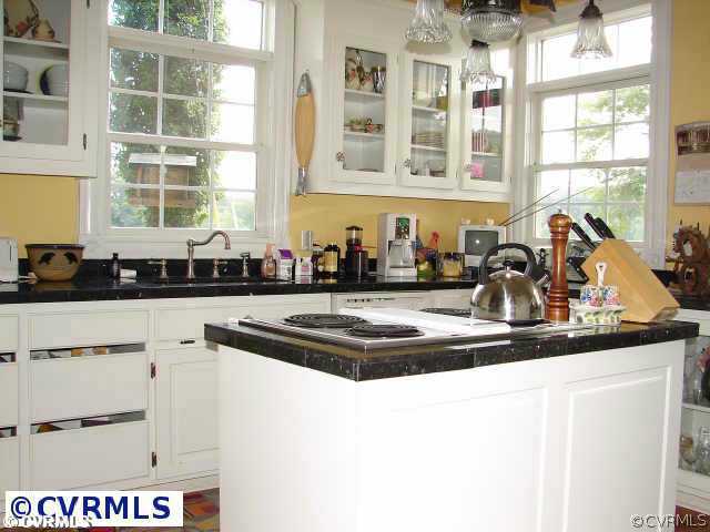 1745 Cardwell Road Crozier, VA 23039 - Photo 9 of 18 a kitchen with a sink and a window