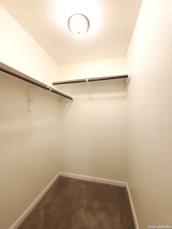 a view of small space with racks on the wall