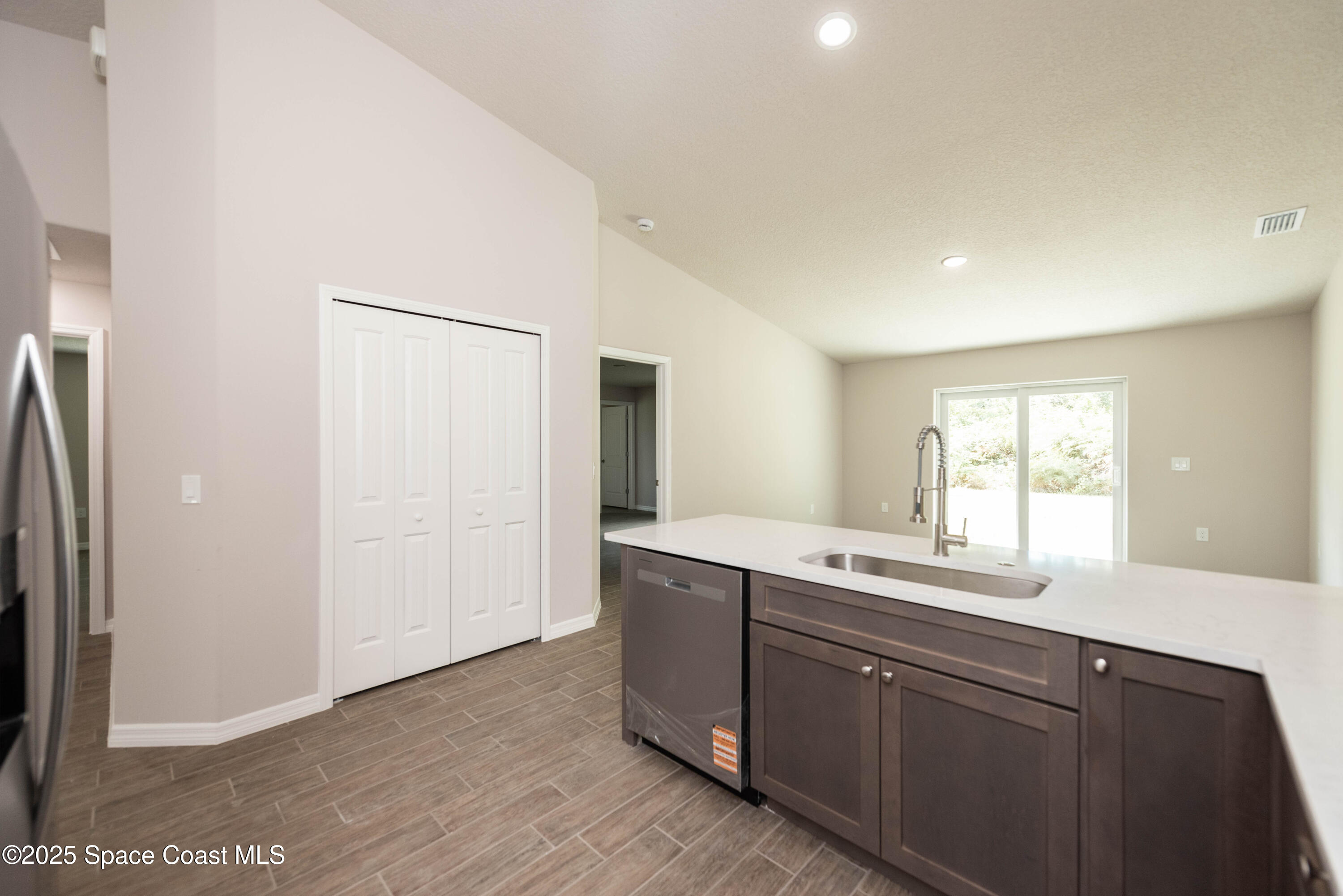 250 Frederick Street Southwest Palm Bay, FL 32908 - Photo 14 of 45 a kitchen with a sink and a window
