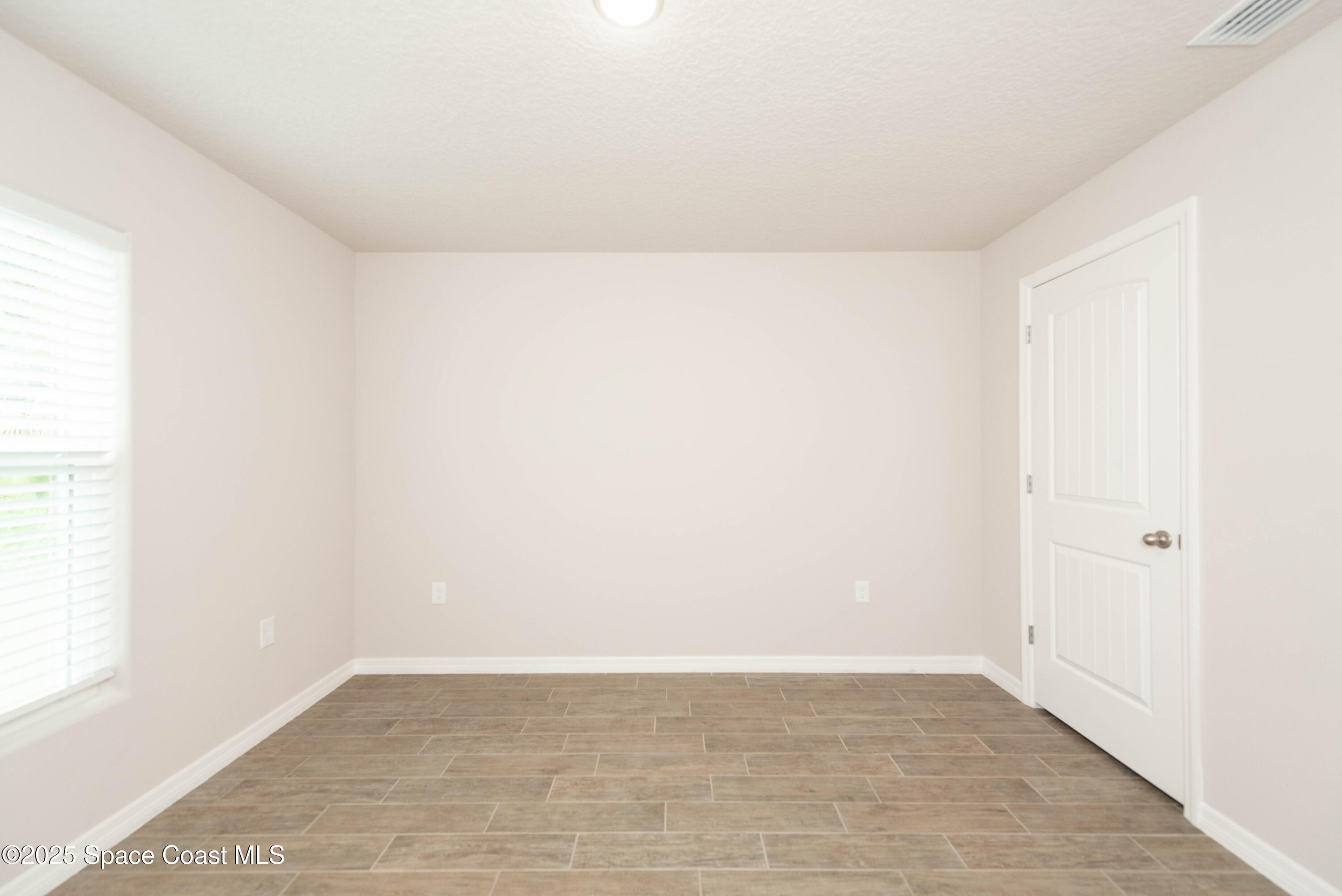 250 Frederick Street Southwest Palm Bay, FL 32908 - Photo 27 of 45 a view of an empty room