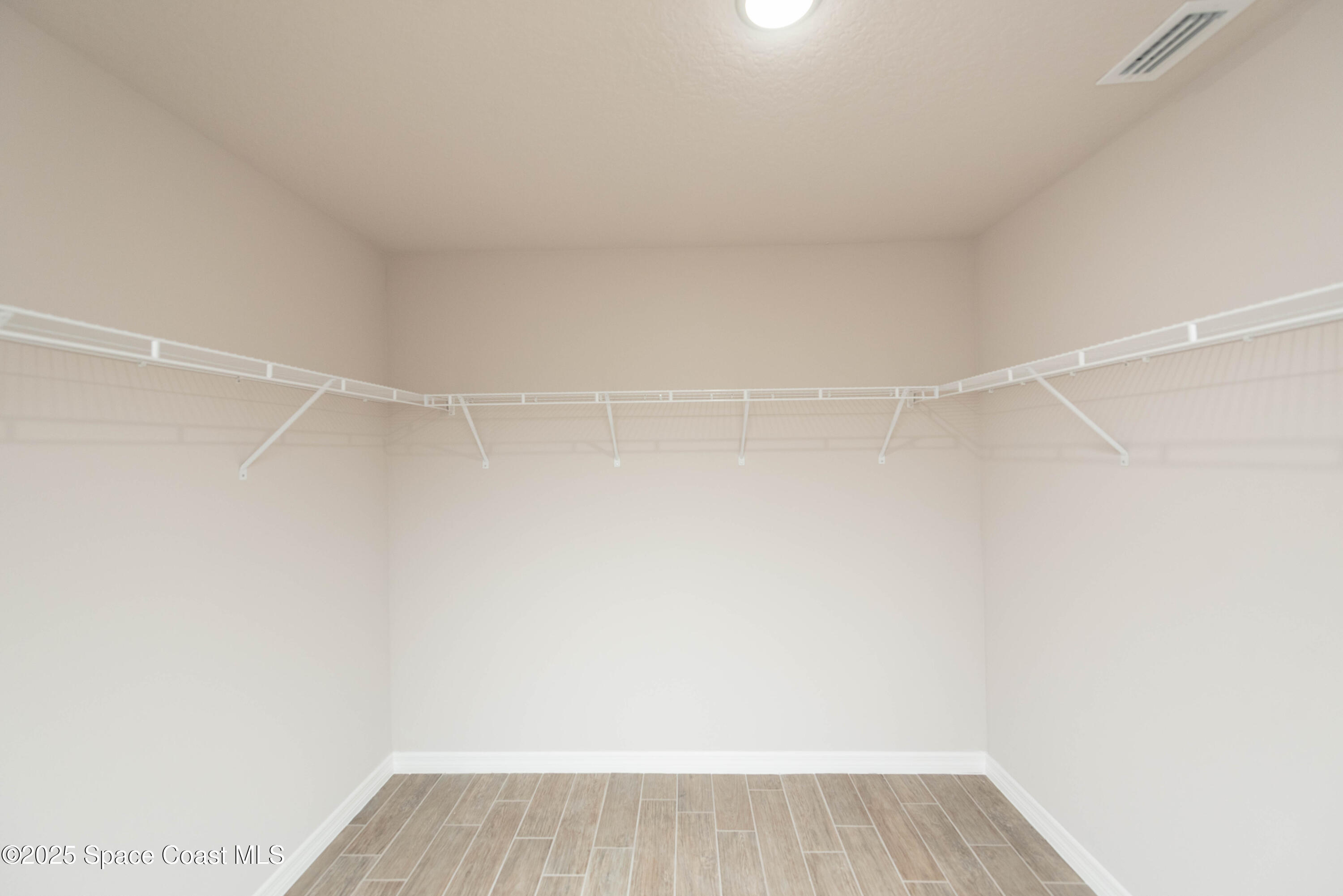 250 Frederick Street Southwest Palm Bay, FL 32908 - Photo 28 of 45 a view of a room with wooden floor