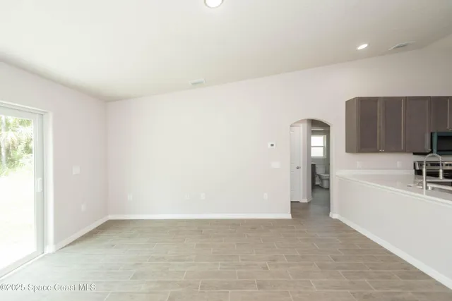 a view of a kitchen with a sink