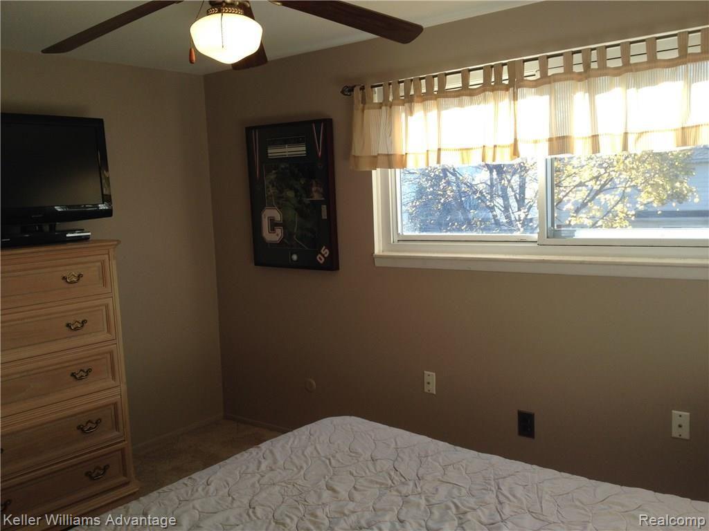 42733 Keystone Canton, MI 48187 - Photo 23 of 34 BEDROOM #3 WITH VIEW OF REAR YARD.