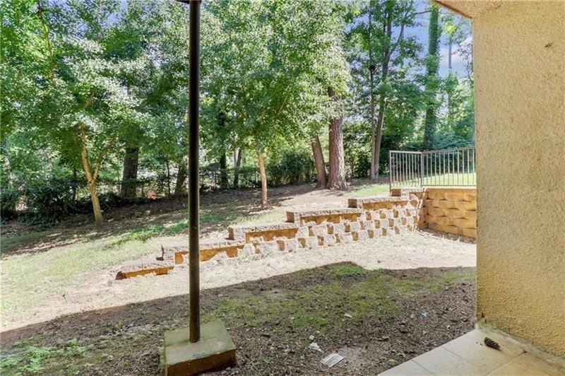 2396 Lawrenceville Highway, Unit V Decatur, GA 30033 - Photo 27 of 27 a view of a yard with trees