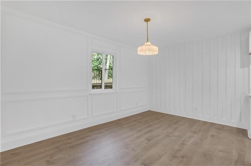 2396 Lawrenceville Highway, Unit V Decatur, GA 30033 - Photo 7 of 27 an empty room with a window