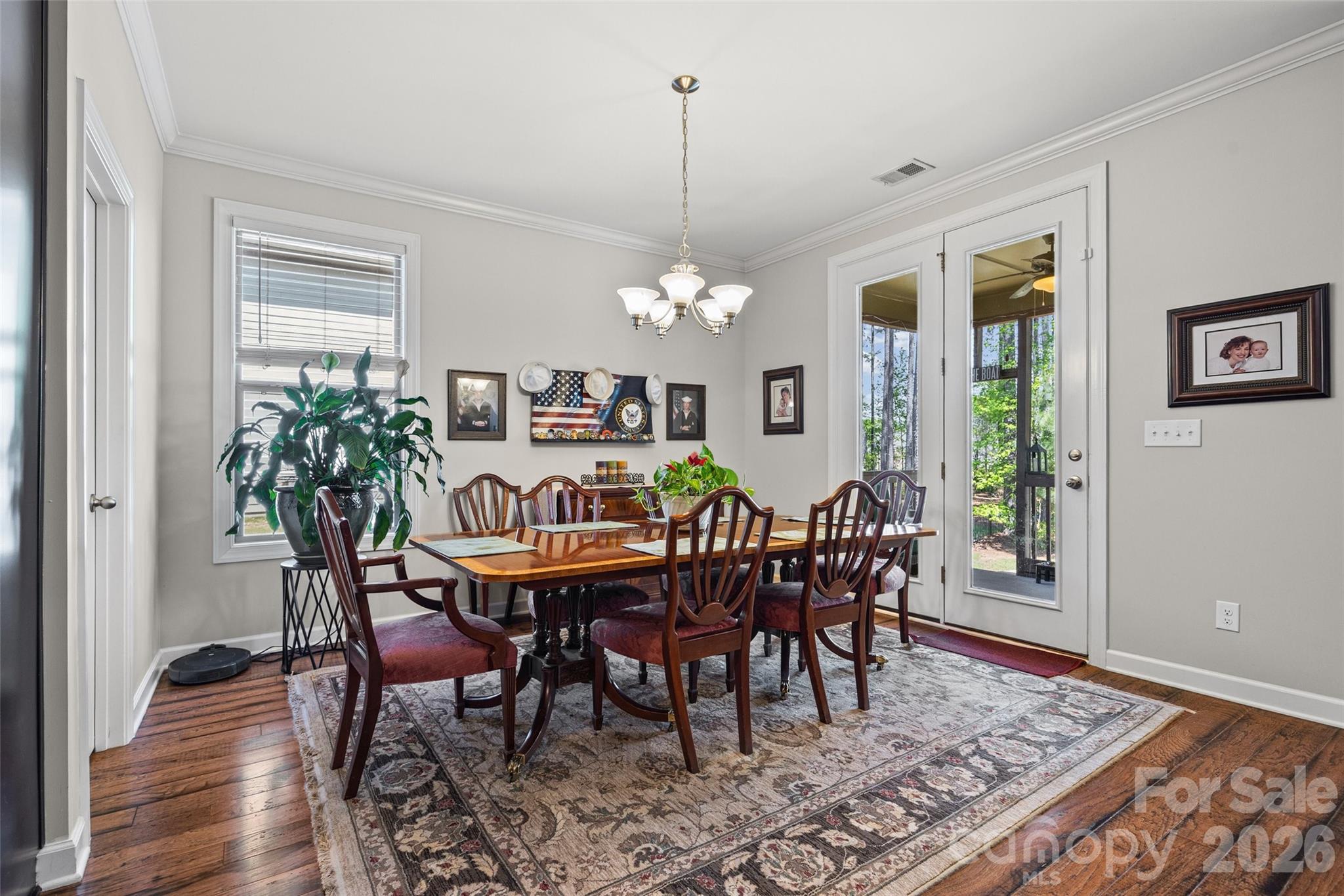 2054 Lometa Road York, SC 29745 - Photo 12 of 45 a view of a dining room with furniture window and wooden floor