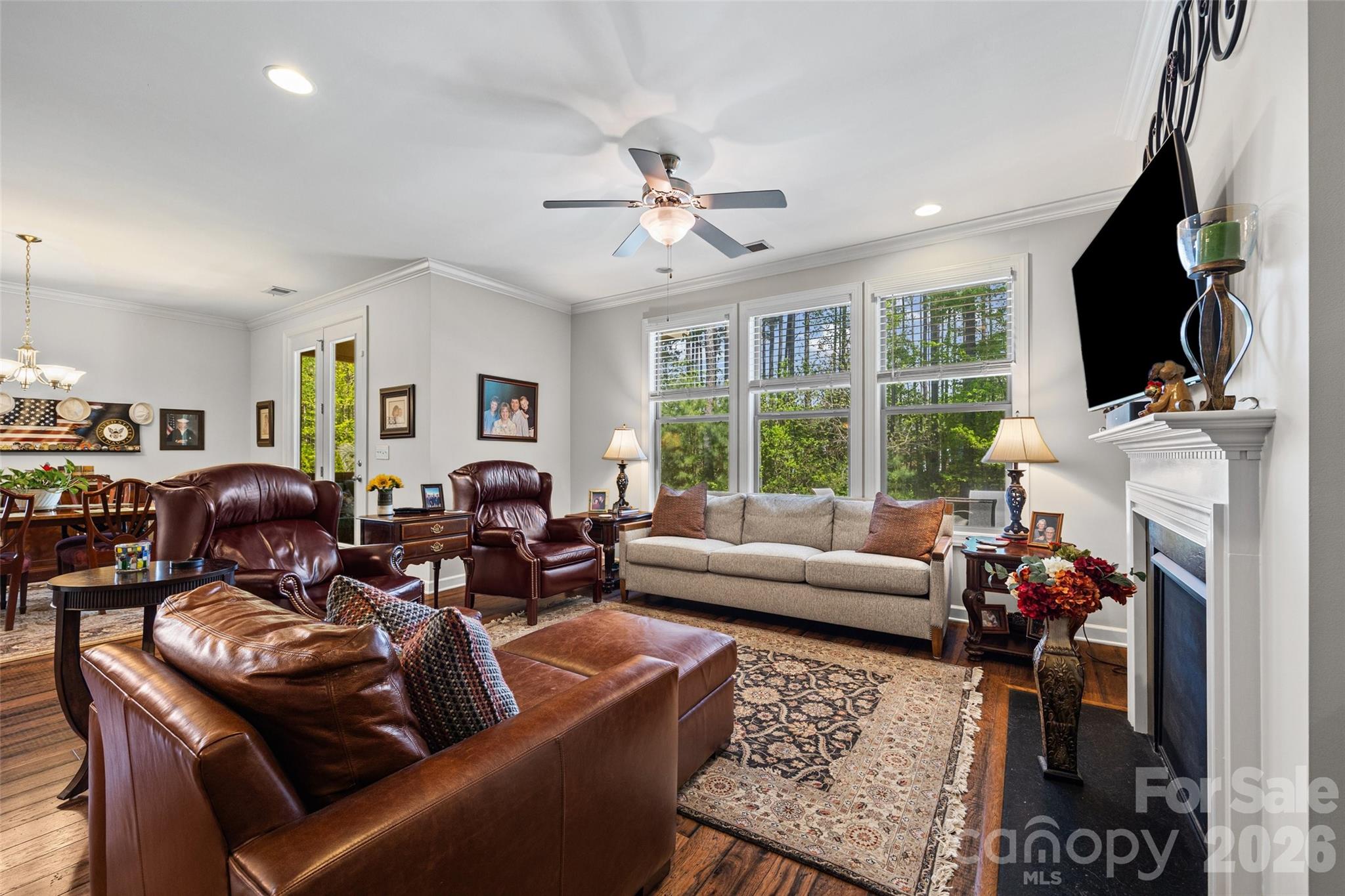2054 Lometa Road York, SC 29745 - Photo 13 of 45 a living room with fireplace furniture and a flat screen tv